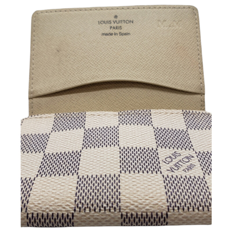 Louis Vuitton<br />
<br />
Card Holder<br />
<br />
Damier Azure<br />
<br />
 MM Initials on tope inside flap<br />
<br />
Condition: Grerat. Inside no spots just initials. Outside: Wear from Jeans: Ink Transfer: Has not been cleaned